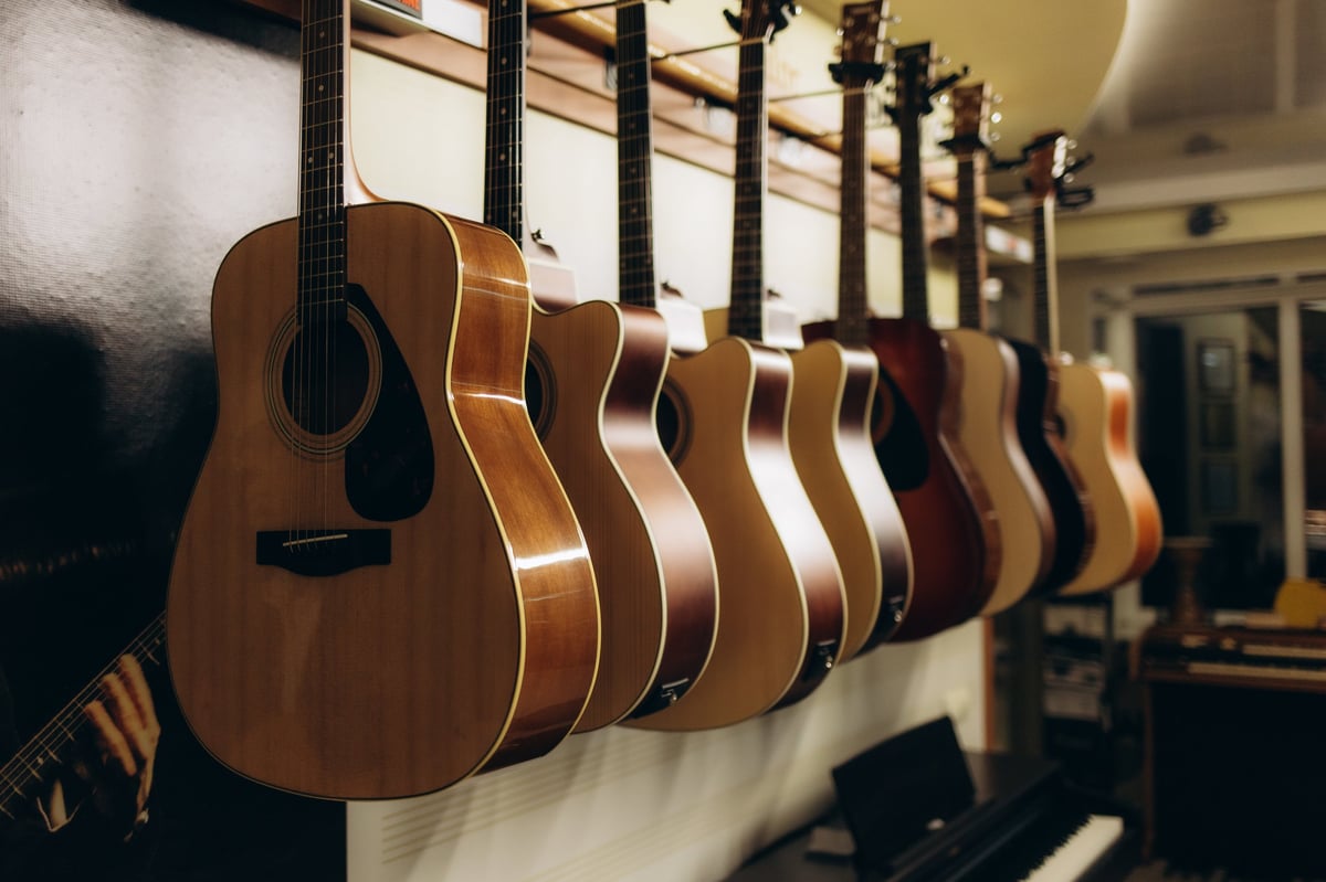 Acoustic guitars displayed in a music shop